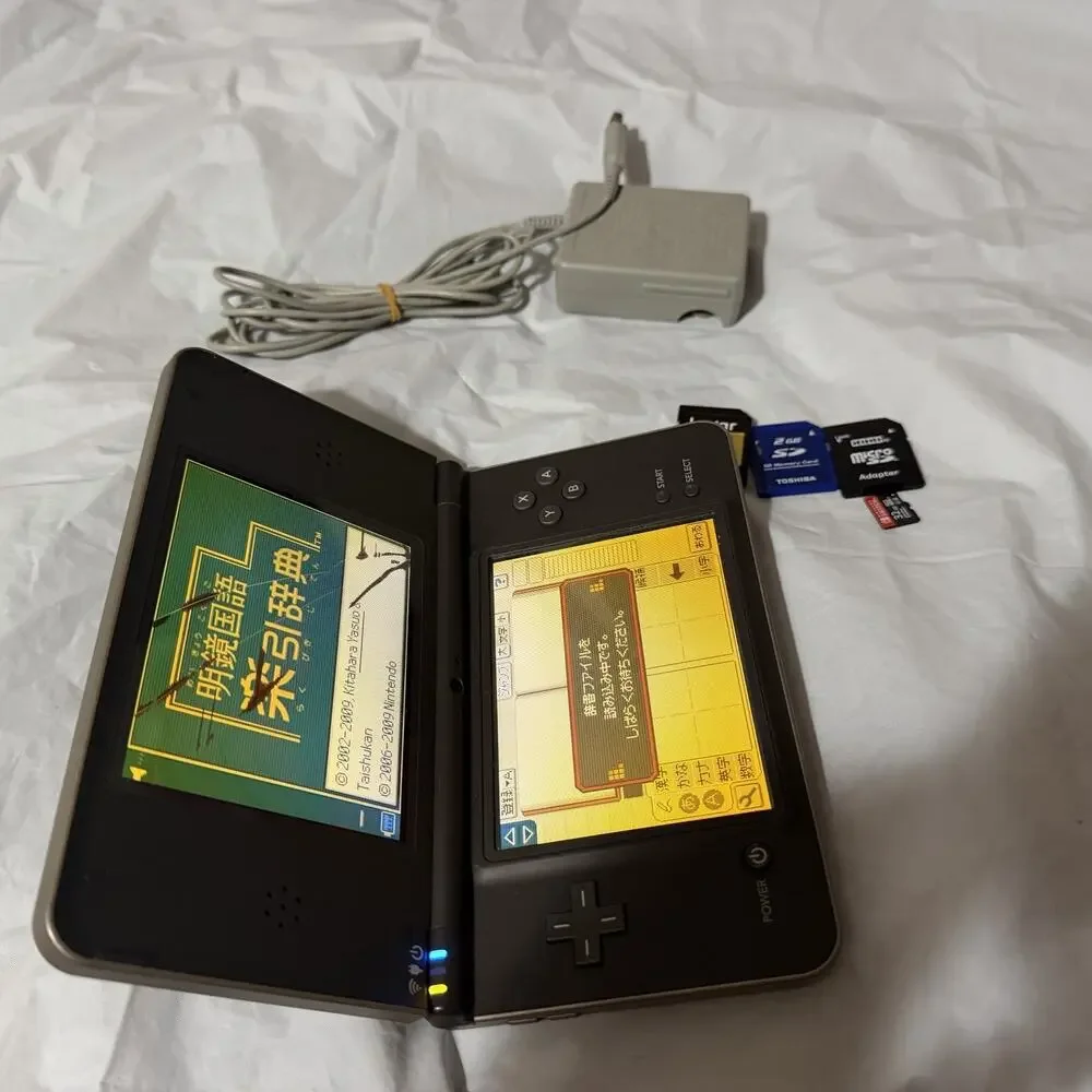 Nintendo DSi LL Bronze/Dark Brown Japanese Version Plays US Games RD DESCRIPTION